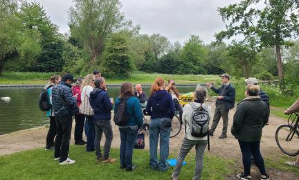 Consortium members by the river