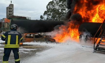 firefighter putting out a fire.